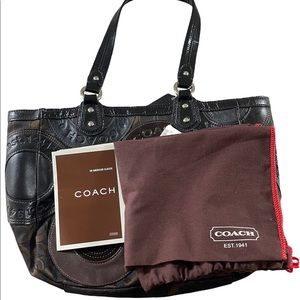 Coach, medium size, brown, preowned but barely used.